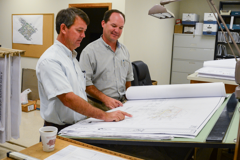 Bradley Plumbing and heating staff reviewing job plans