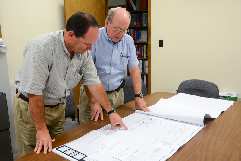 Bradley Plumbing and heating staff reviewing job plans