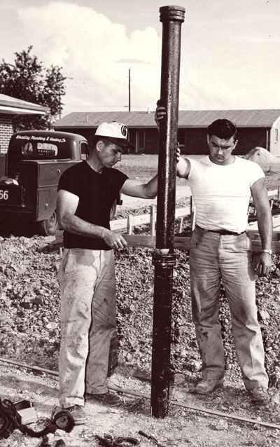 historic photo of Bradley Plumbing and Heating workers